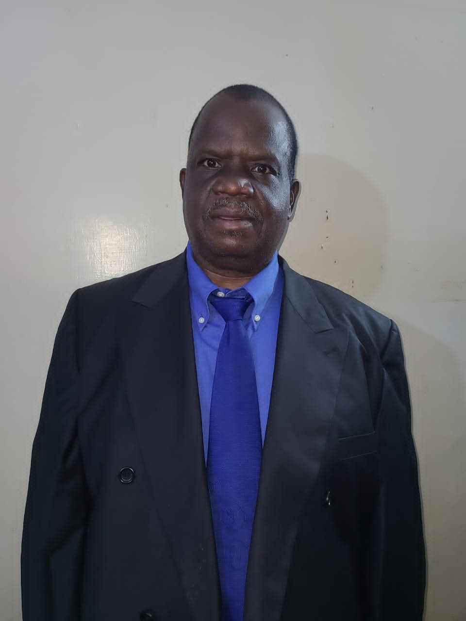Trustee Dr. Lipita